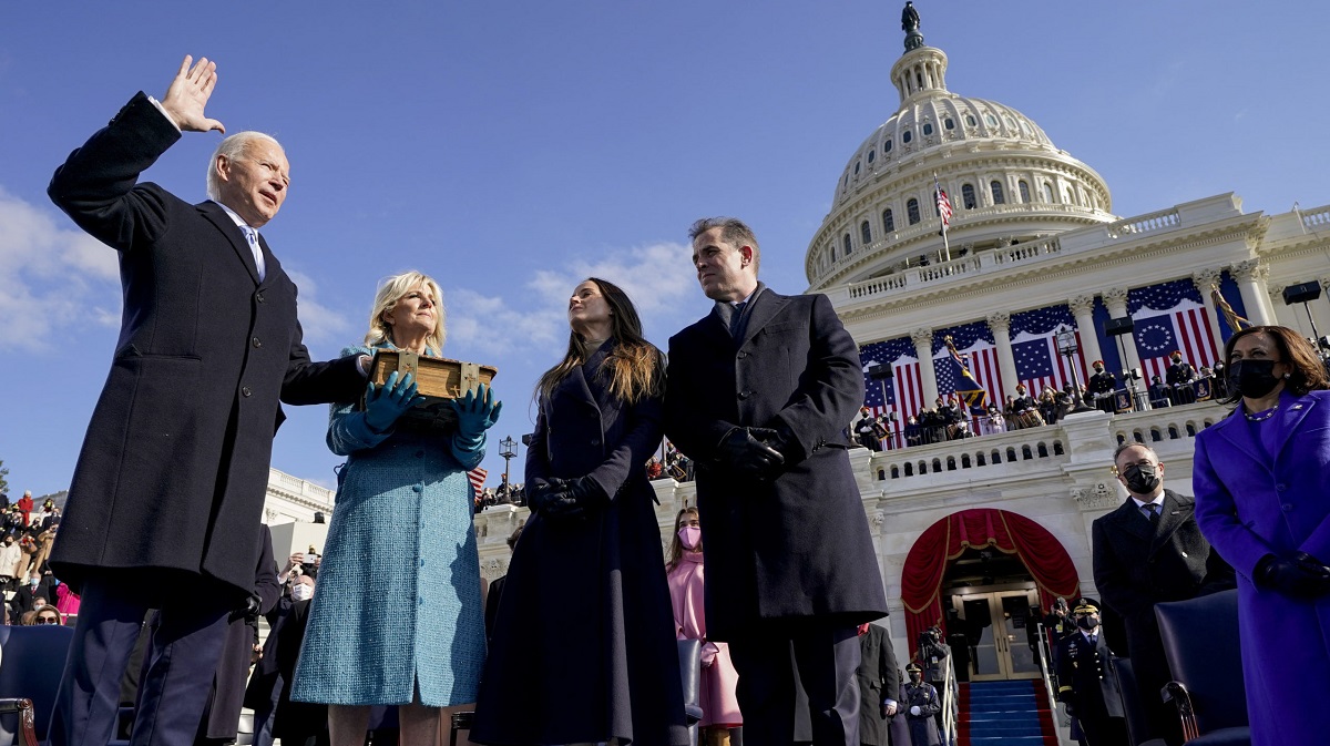 Joe Biden is sworn in as the 46th president of the United States by Chief Justice John Roberts as Jill Biden holds the Bible during the 59th Presidential Inauguration at the U.S. Capitol, in Washington, U.S., 20 January 2021. Andrew Harnik/Pool via Reuters
