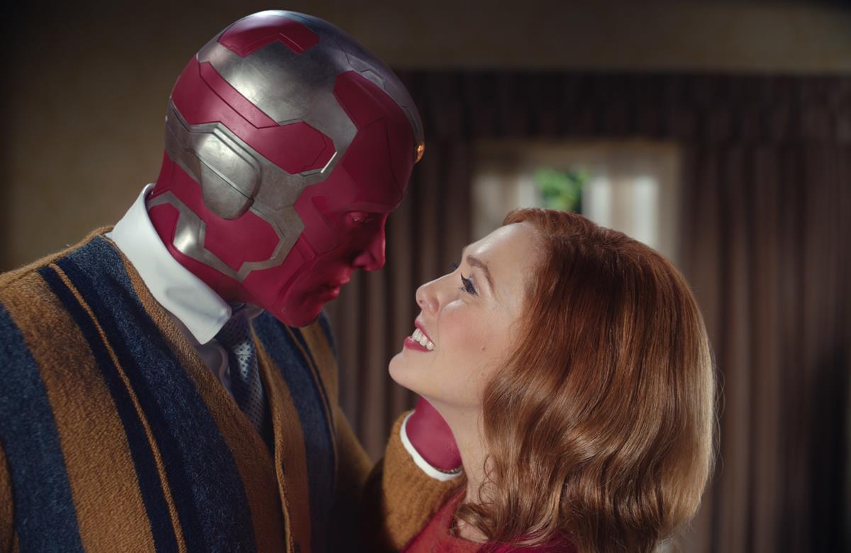 (L -R): Paul Bettany as VIsion and Elizabeth Olsen as Wanda Maximoff in “WandaVision.” Cr: Marvel Studios