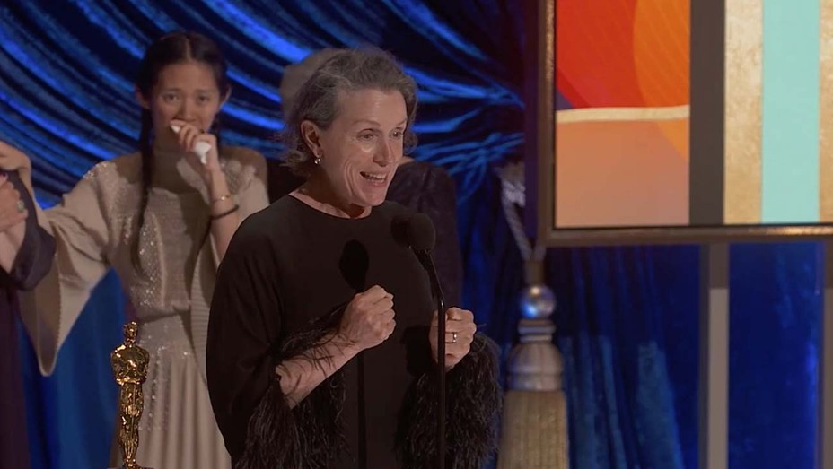 2021 Academy Award Best Actress Frances McDormand for “Nomadland,” with Best Director Chloe Zhao in the background. Cr: AMPAS/ABC