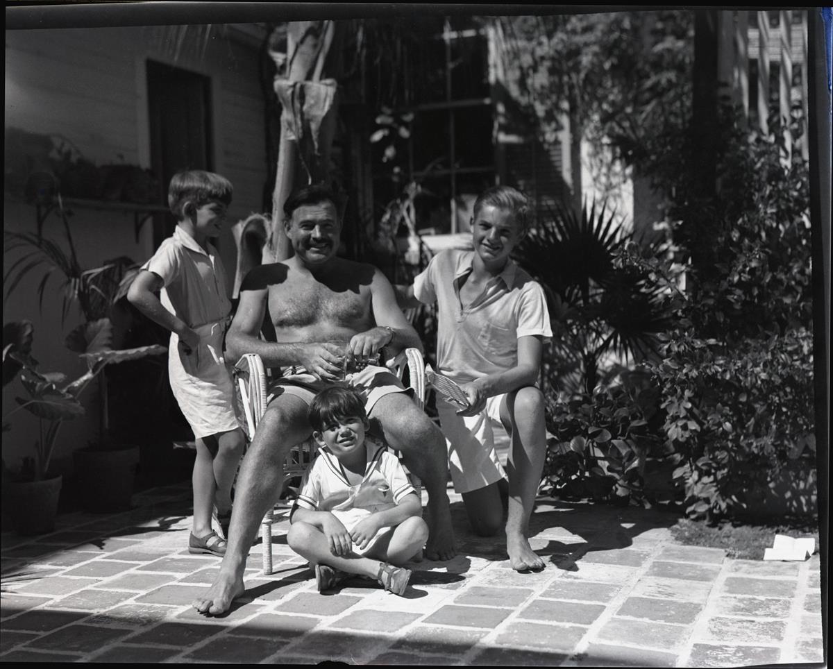 Ernest Hemingway with his three sons, Jack, Patrick, and Gregory at his Key West home. Cr: Patrick Hemingway Papers, Manuscripts Division, Department of Special Collections, Princeton University Library