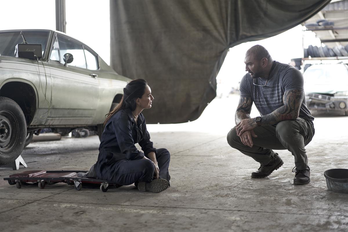 Ana de la Reguera as Cruz and Dave Bautista as Scott Ward in “Army of the Dead,” written and directed by Zack Snyder. Cr: Clay Enos/Netflix