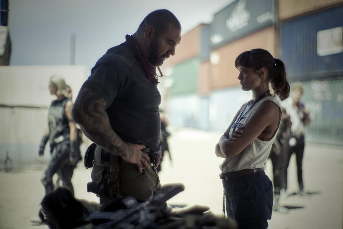 Dave Bautista as Scott Ward and Ella Purnell as Kate Ward in “Army of the Dead,” written and directed by Zack Snyder. Cr: Clay Enos/Netflix