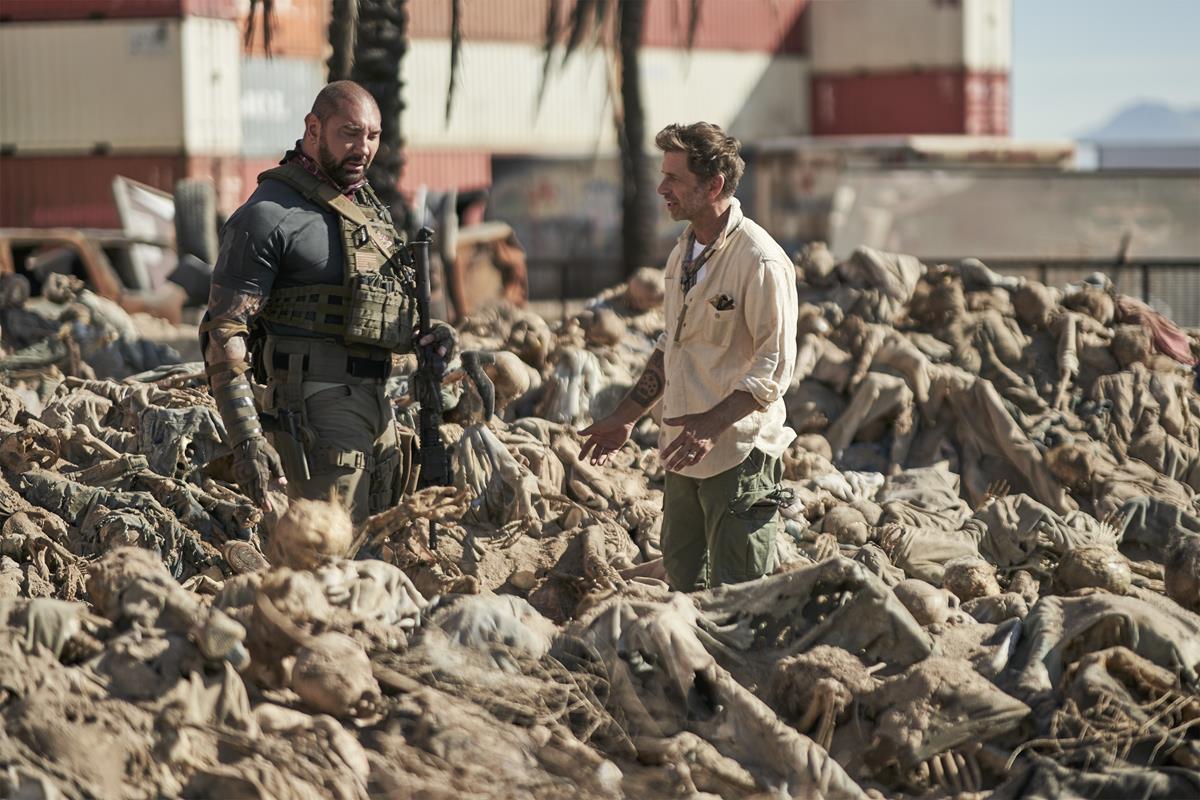 Dave Bautista and director, producer and writer Zack Snyder on the set of “Army of the Dead.” Cr: Clay Enos/Netflix