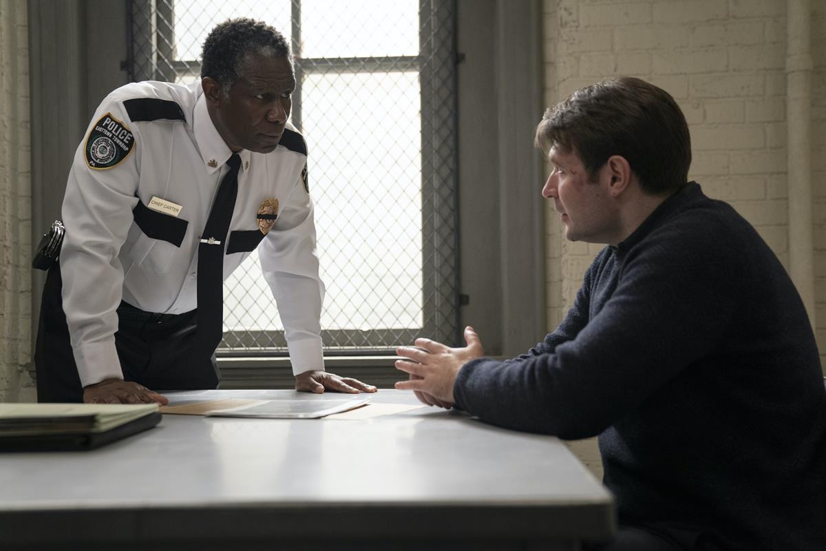 John Douglas Thompson and Evan Peters in “Mare of Easttown.” Cr: HBO