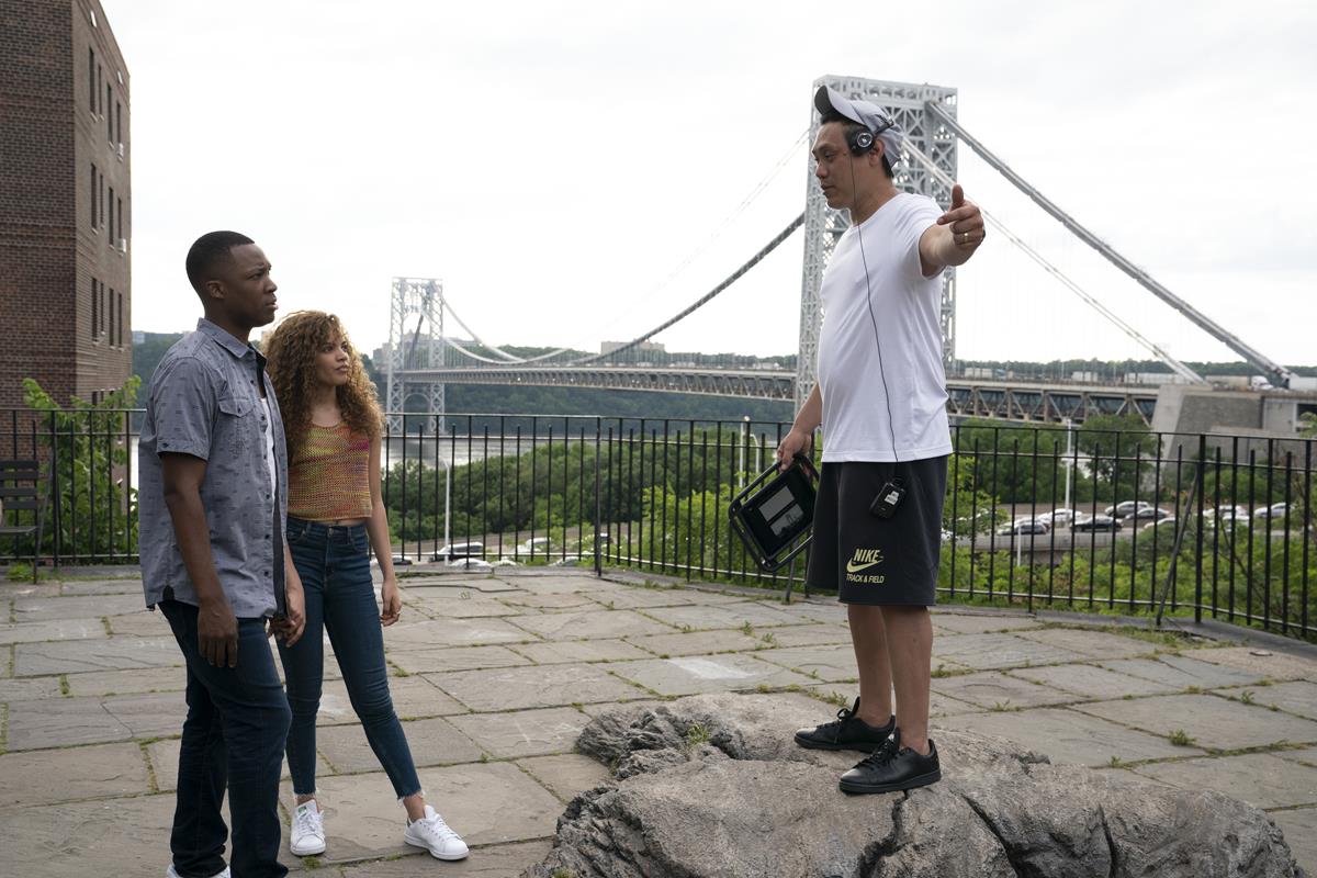 Corey Hawkins, Leslie Grace and director Jon M. Chu on the set of the screen adaptation of “In The Heights.” Cr: Macall Polay/Warner Bros.