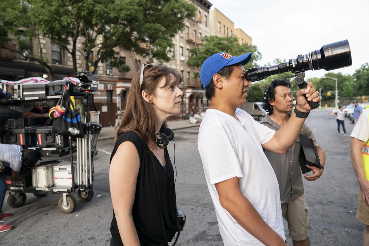 Director of photography Alice Brooks and director Jon M. Chu on the set of the screen adaptation of “In The Heights.” Cr: Macall Polay/Warner Bros.