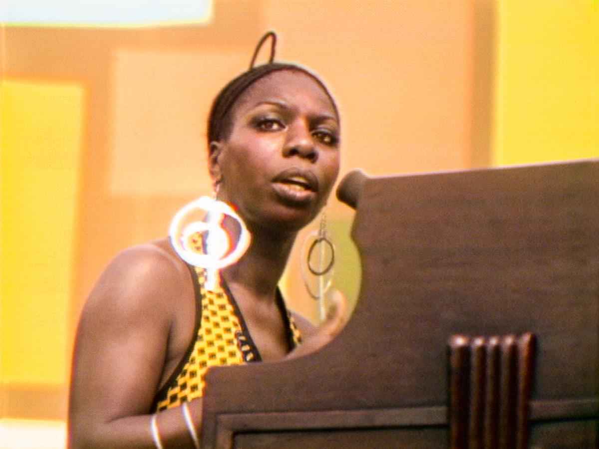 Nina Simone performs at the Harlem Cultural Festival in 1969, featured in the documentary “Summer Of Soul (Or, When The Revolution Could Not Be Televised).” Cr: Mass Distraction Media/Searchlight Pictures