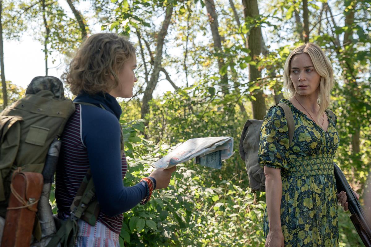Regan (Millicent Simmonds), left, and Evelyn (Emily Blunt) brave the unknown in “A Quiet Place Part II.” Cr: Paramount Pictures