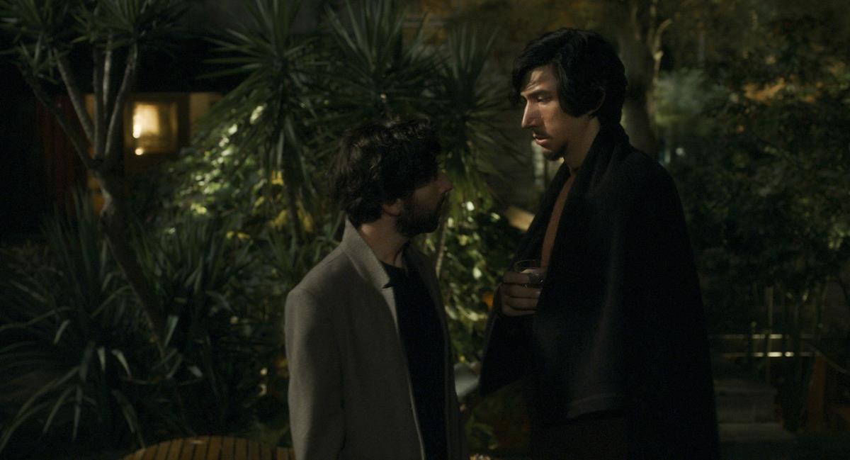 Simon Helberg as The Conductor and Adam Driver as Henry McHenry in director Leos Carax’s “Annette.” Cr: Amazon Studios