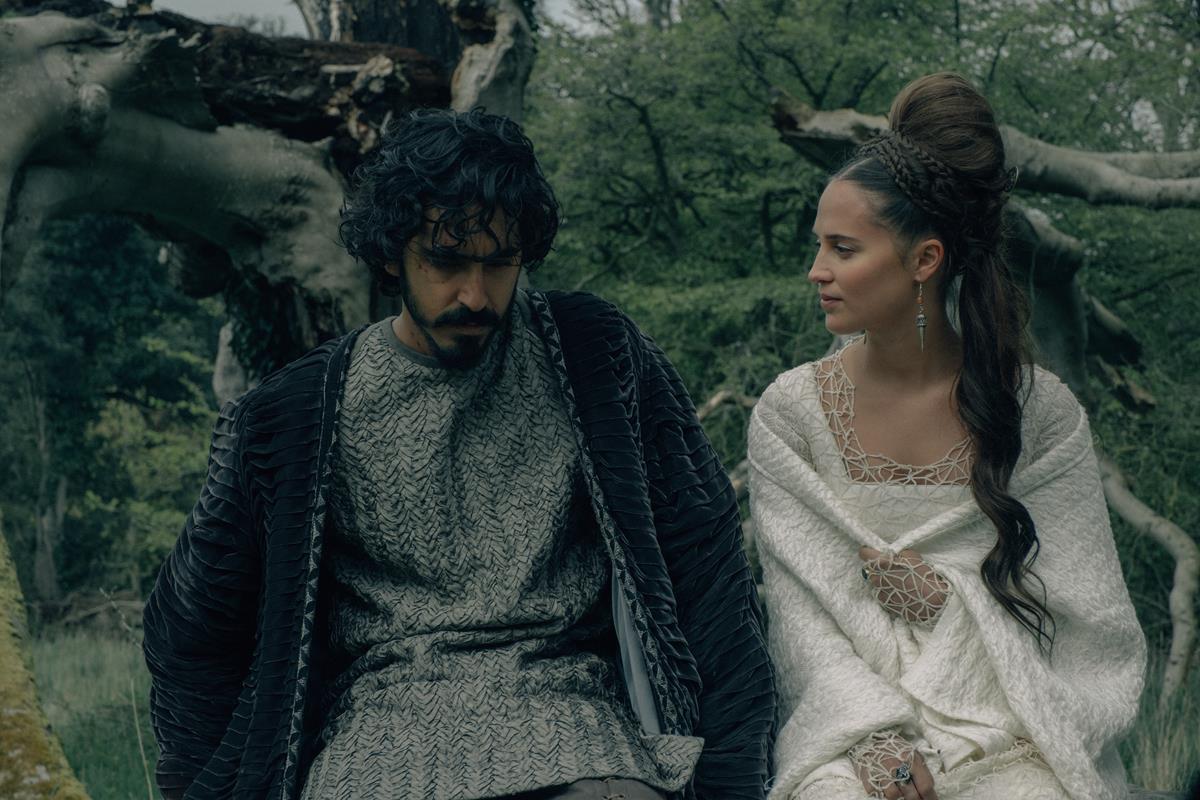 Dev Patel and Alicia Vikander in “The Green Knight.” Cr: Eric Zachanowich/A24