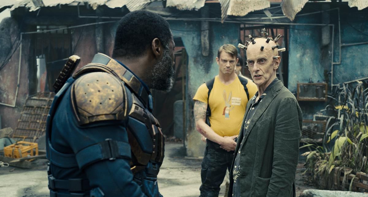 Idris Elba as Bloodsport, Joel Kinnaman as Colonel Rich Flag and Peter Capaldi as Thinker in director James Gunn’s “The Suicide Squad.” Cr: Warner Bros. Pictures/DC Comics
