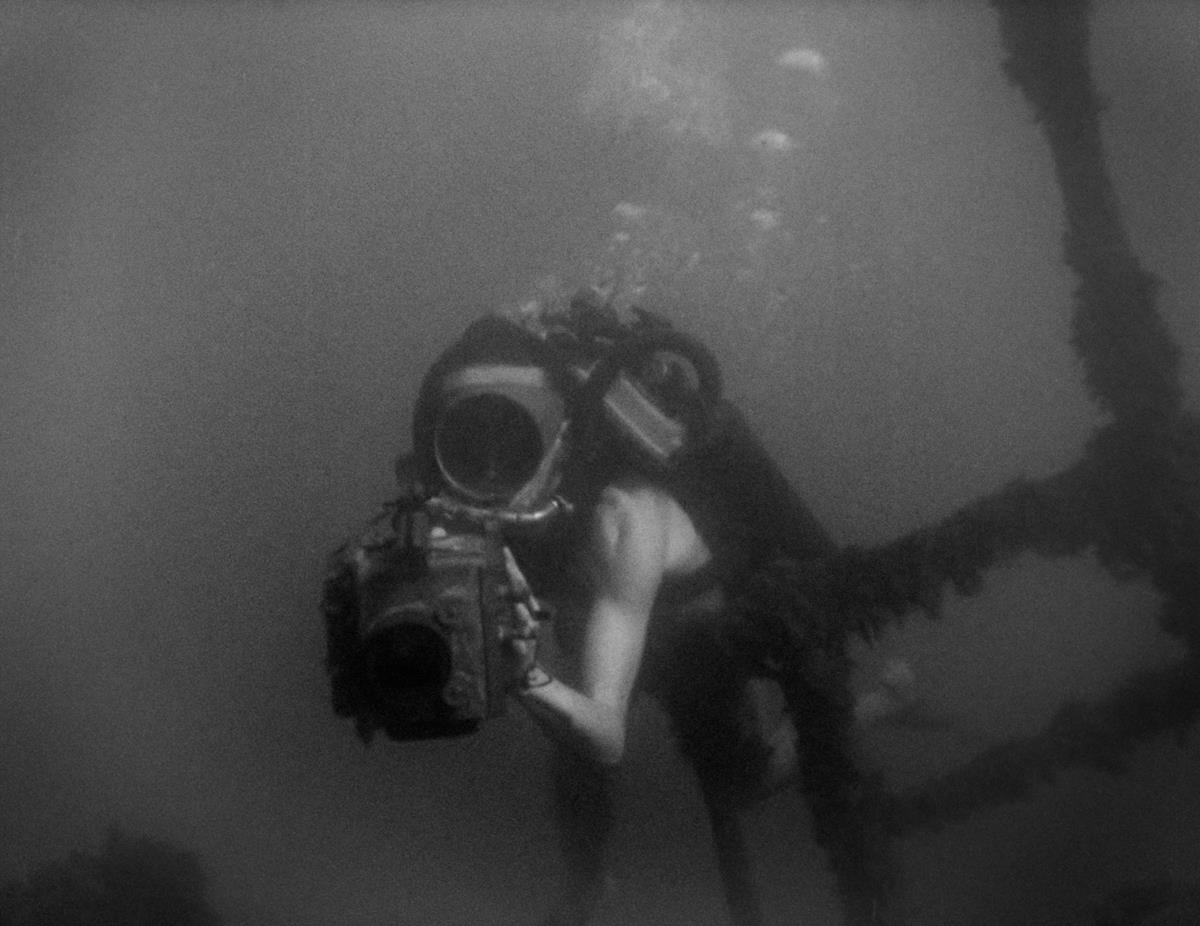 Jacques Cousteau films an underwater shipwreck in the Mediterranean Sea in 1943 in director Liz Garbus’ “Becoming Cousteau.” Cr: National Geographic