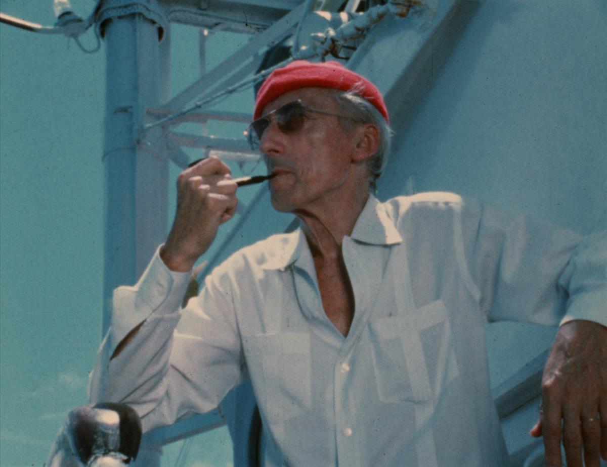 Jacques Cousteau wears his iconic red diving cap aboard his ship Calypso, circa 1970s in director Liz Garbus’ “Becoming Cousteau.” Cr: National Geographic