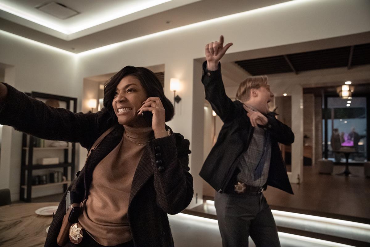 Tiffany Haddish as Detective Danner and John Early as Detective Culp in episode 8 of “The Afterparty.” Cr: Apple TV+