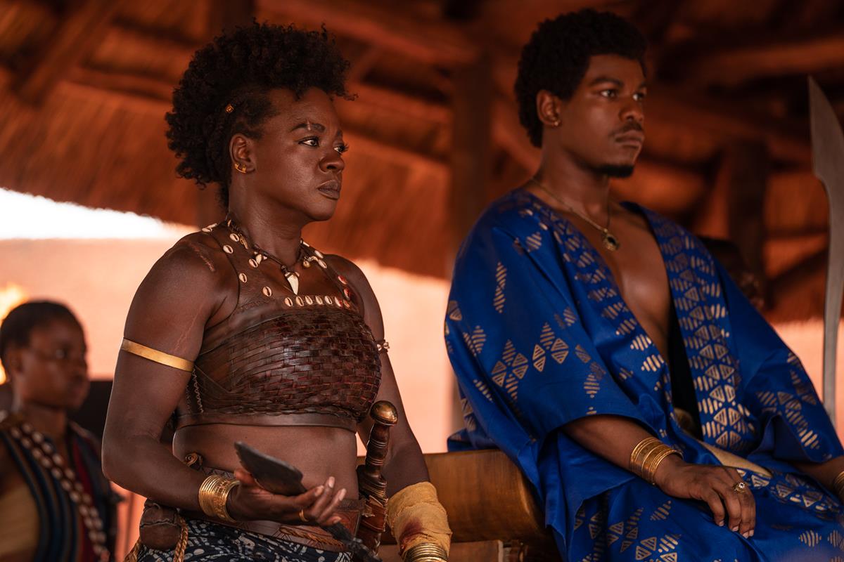 Viola Davis as Nanisca and John Boyega as King Ghezo in director Gina Prince-Bythewood’s “The Woman King.” Cr: Ilze Kitshoff/Sony