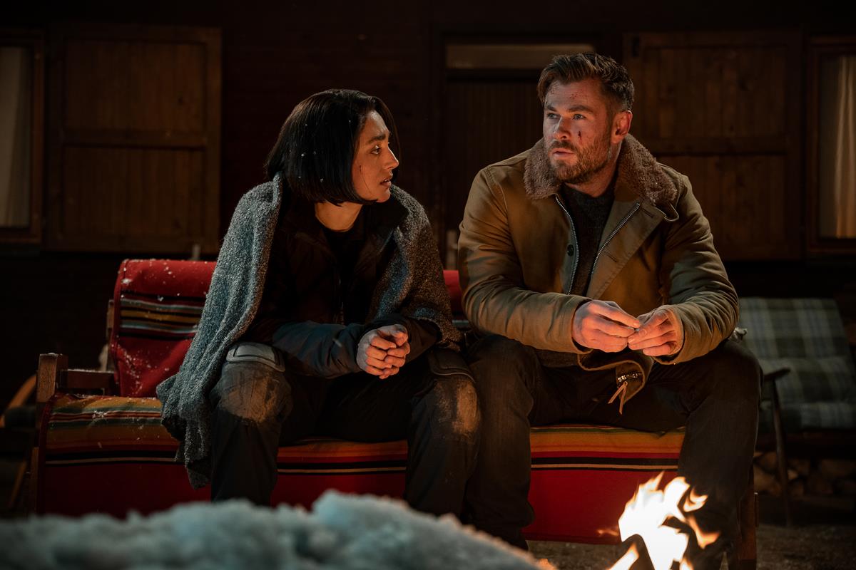 Golshifteh Farahani as Nik Khan and Chris Hemsworth as Tyler Rake in “Extraction 2.” Cr: Jasin Boland/Netflix