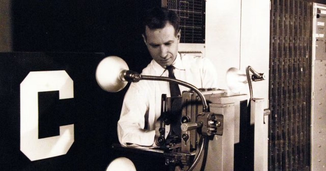 Frank Rosenblatt with the Mark I Perceptron, the first artificial neural network computer, unveiled in 1958. Cr: National Museum of the US Navy/Flickr